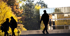students walking on fall campus